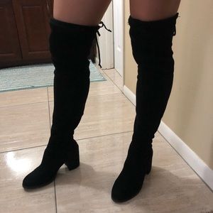 Thigh high black boots